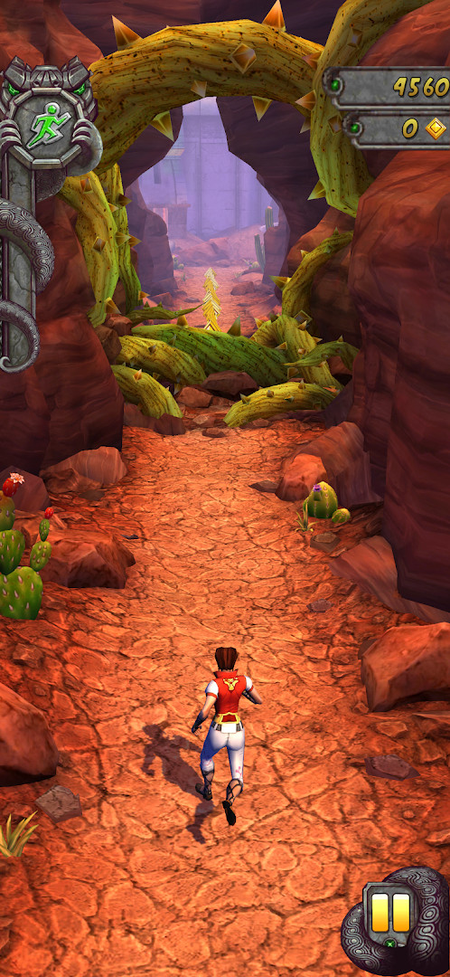 Surfing down an icy mountain slope while dodging rocks and trees
